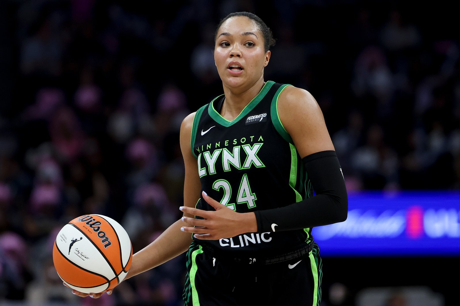 Napheesa Collier #24 of the Minnesota Lynx looks to pass during the third quarter against the Golden State Valkyries at Target Center on September 11, 2025 in Minneapolis, Minnesota.
