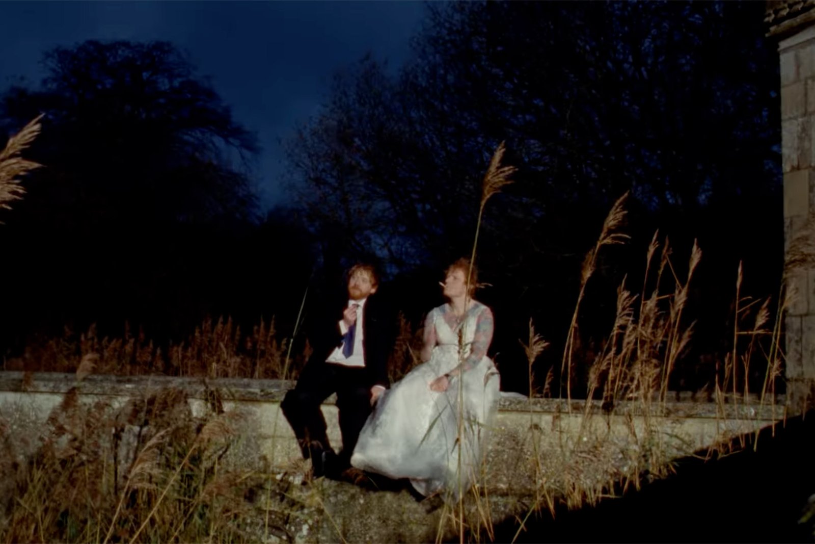 Rupert Grint and Ed Sheeran in the music video for "A Little More"