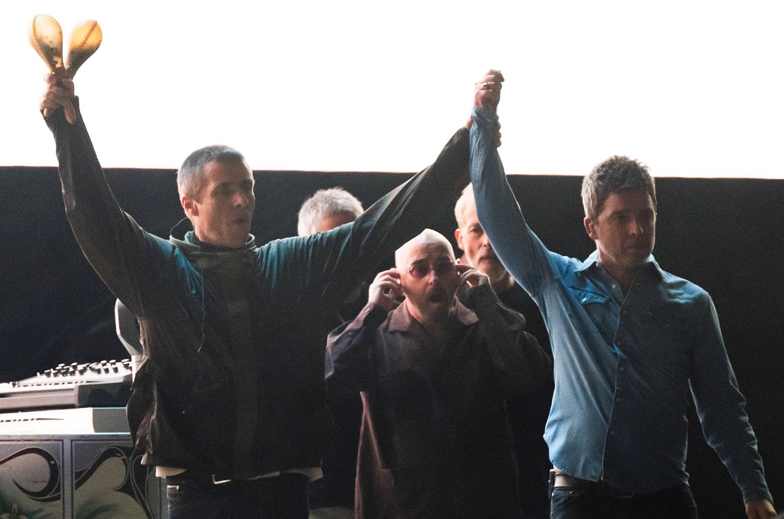 Liam Gallagher (L) and Noel Gallagher (R) of Oasis perform during the opening night of their Live 25' Tour at Principality Stadium on July 04, 2025 in Cardiff, Wales. (Photo by Samir Hussein/WireImage)