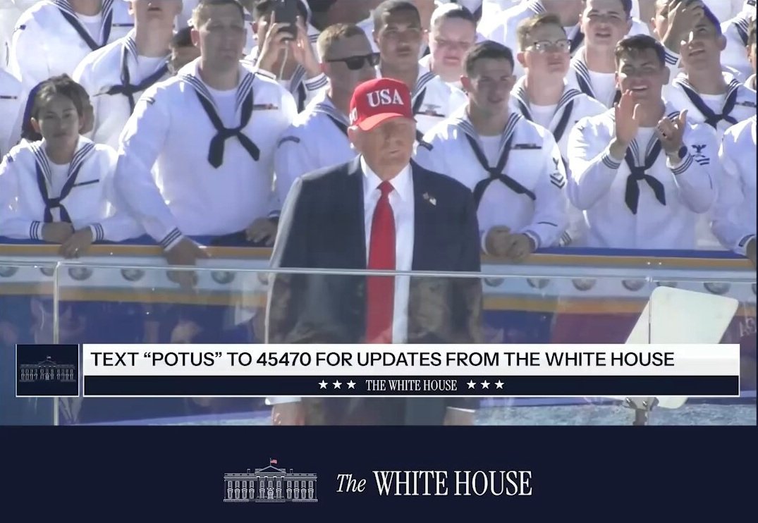 Former President Donald Trump speaks at an event with a crowd of sailors, promoting updates from the White House via text.
