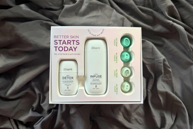 Shark FacialPro Glow packaging including skincare serums and exfoliation nozzles