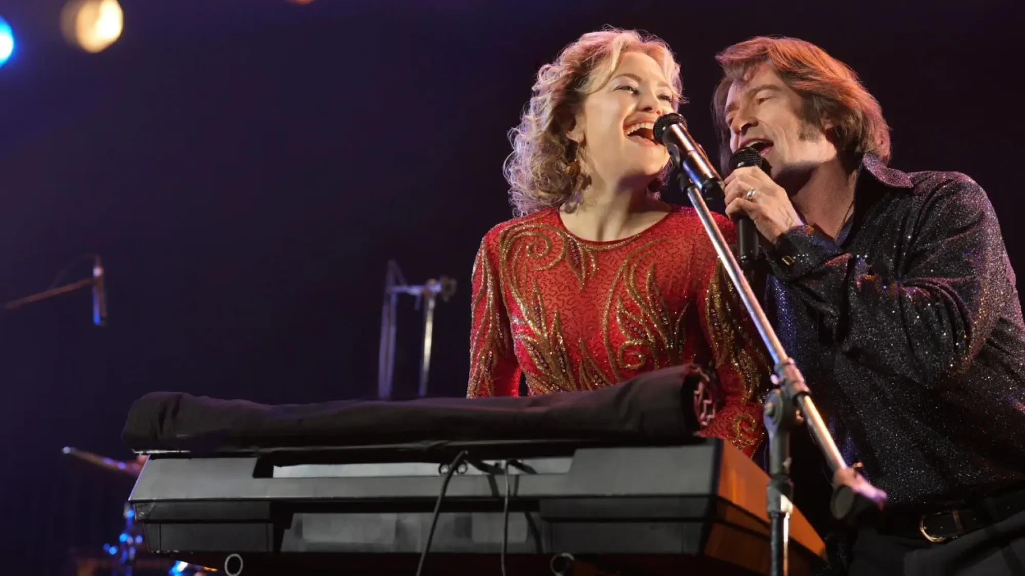 Kate Hudson as Claire Stengl and Hugh Jackman as Mike Sardina in director Craig Brewer's "Song Sung Blue."